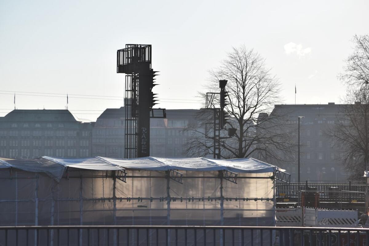 Sand Batteries: Storing Solar and Wind as Affordable Heat for Town-Scale Networks